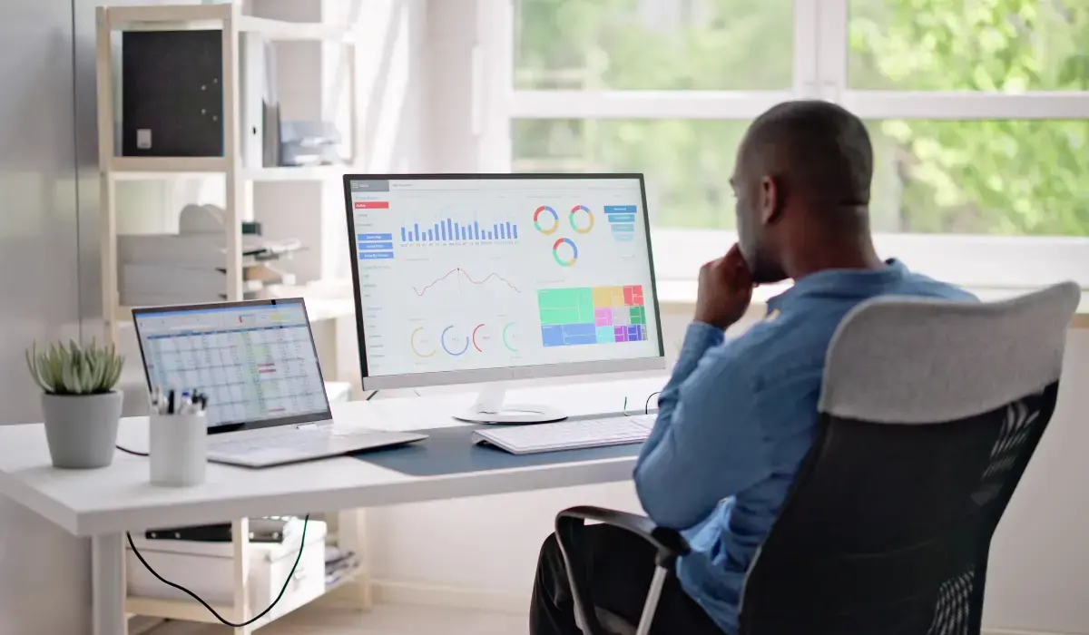 Corporate risk manager analyzing different views of insurance data. 